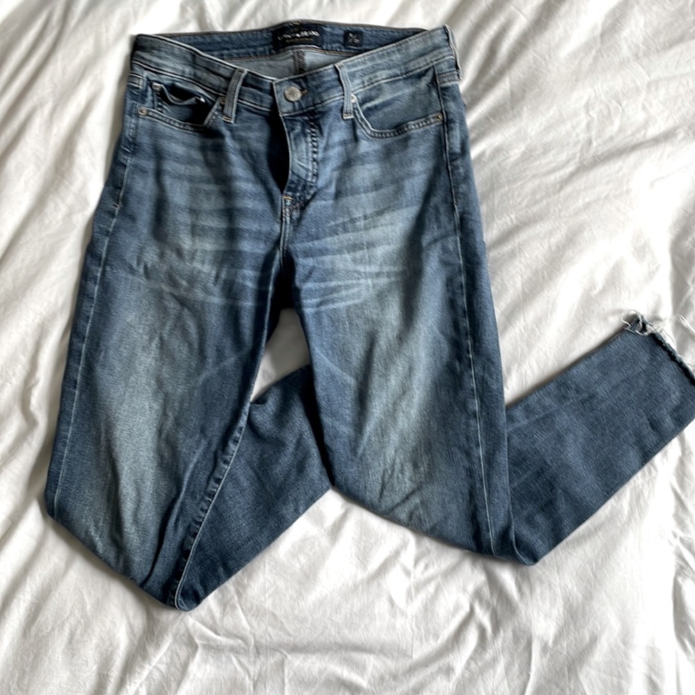 Lucky Brand medium wash skinny jeans, frayed hem